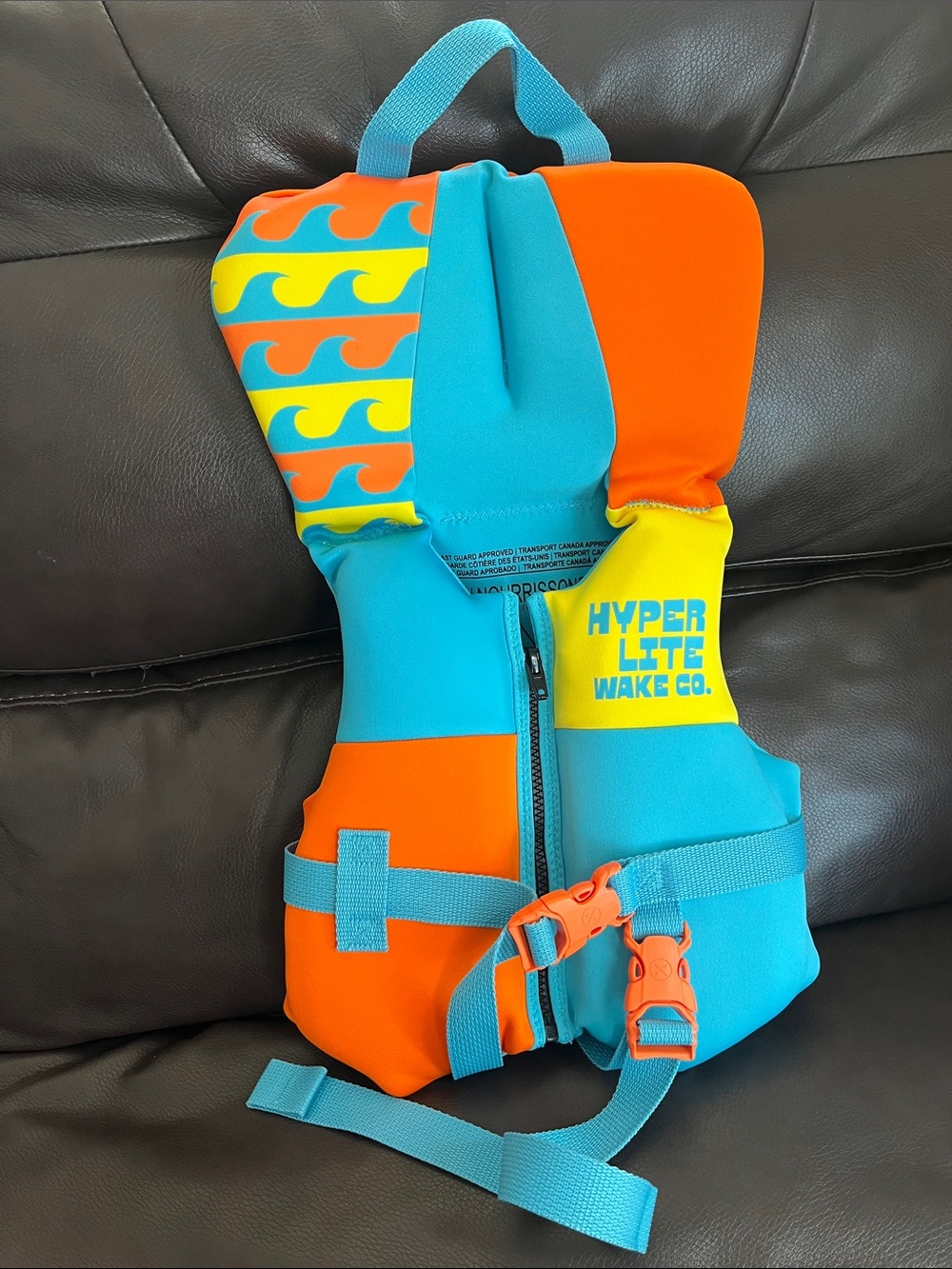 Hyper Lite Wake Co. Kids Life Jacket - Teal, Orange, Yellow